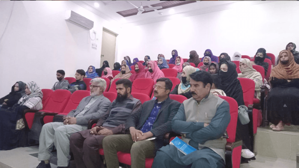Audience seated in the auditorium during peaceful election seminar