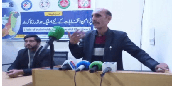 Speaker addressing stakeholders at peaceful elections seminar